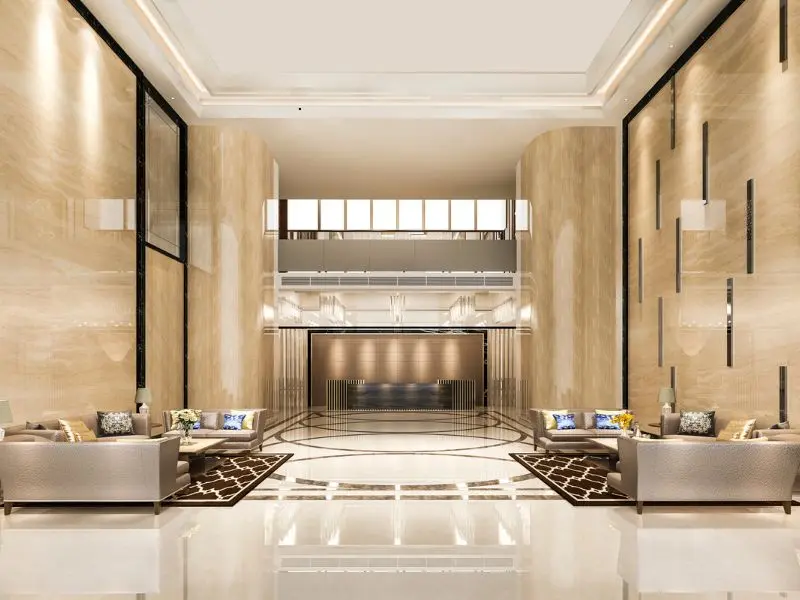 Luxury hotel lobby with marble flooring and elegant seating area.