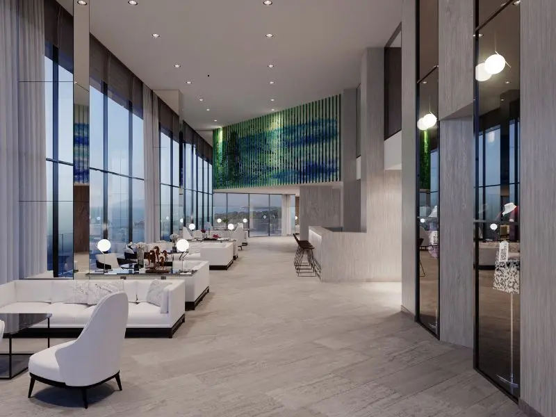 Elegant hotel lobby with modern furniture and spotless floors, enhanced by professional cleaning services.