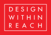 White sans-serif text reading “DESIGN WITHIN REACH” stacked inside a bold red square bordered by a thin white rectangular frame. Modern and clean.